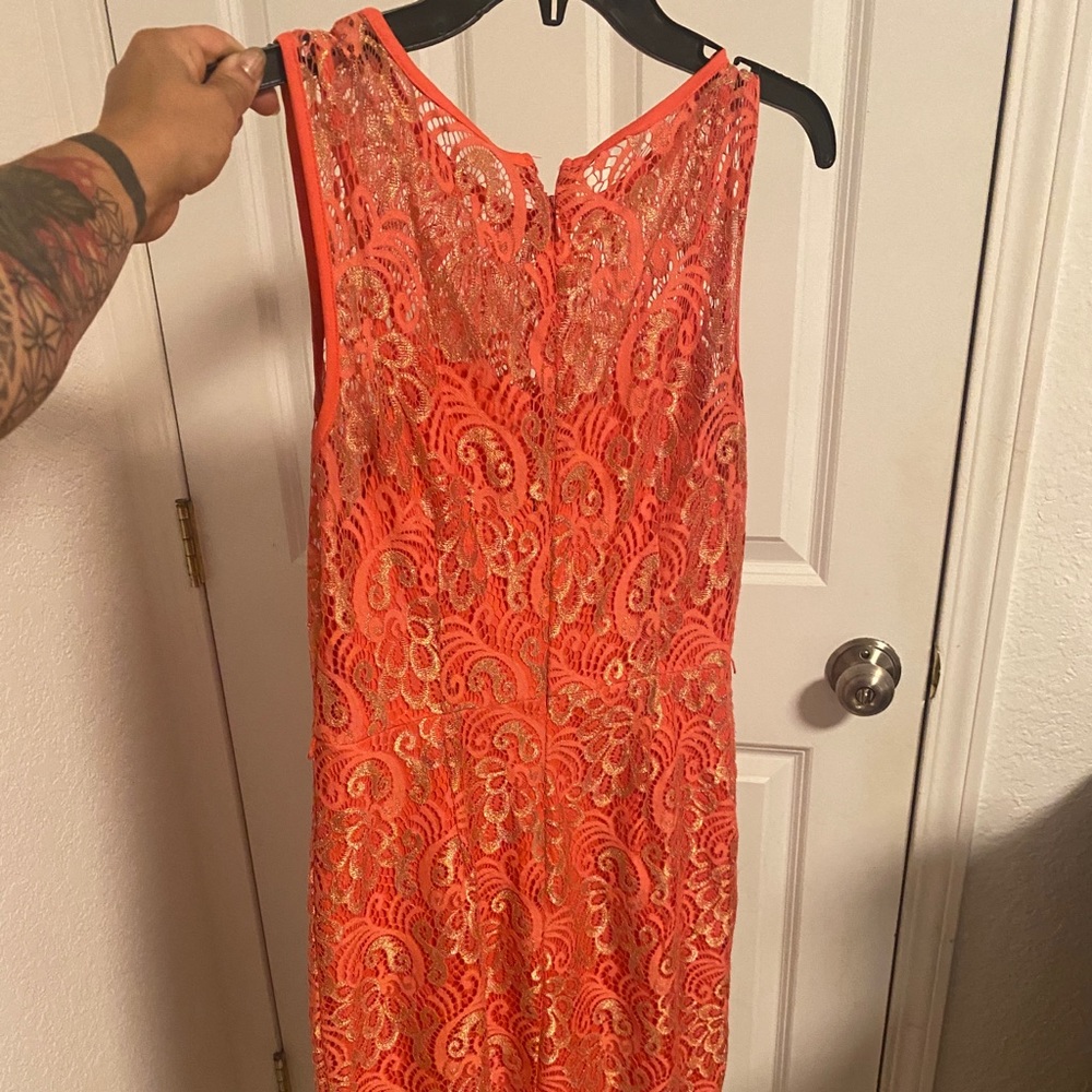Bright coral and gold sheath dress